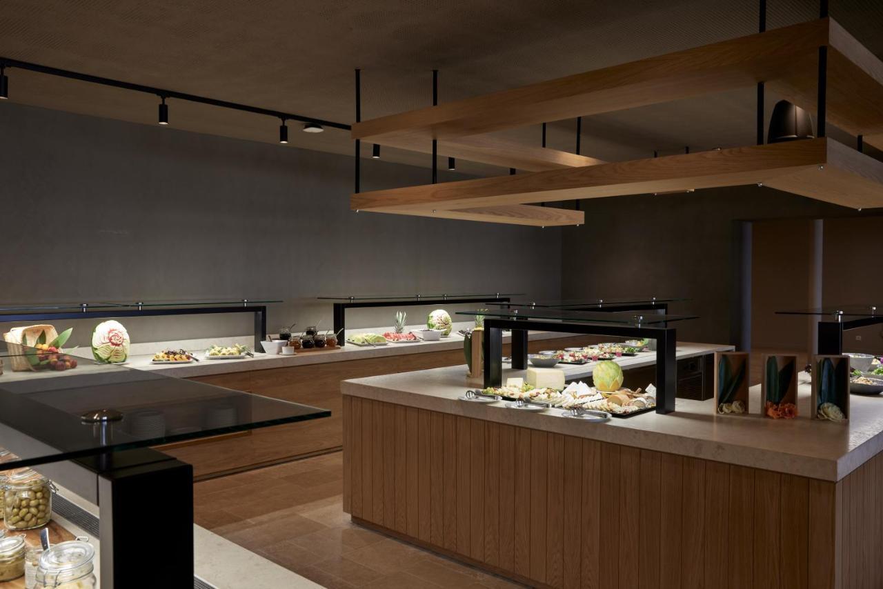 Elissa Adults-Only Lifestyle Beach Resort Kallithéa エクステリア 写真 A buffet at a restaurant